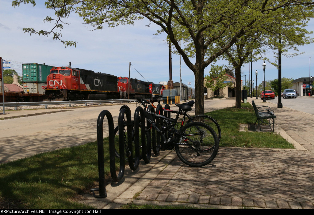 Bikes wait for their riders return as E271 also waits to depart